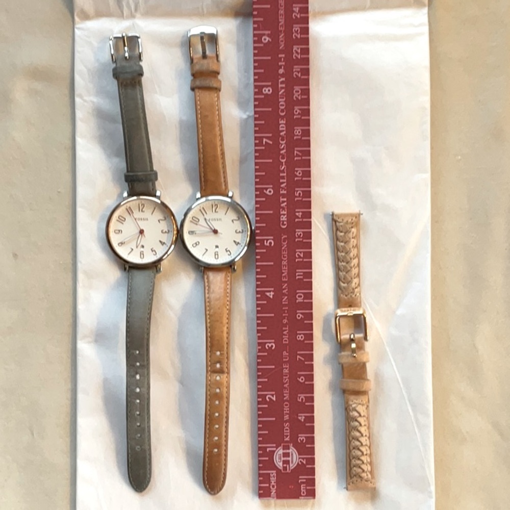 2 Fossil Watches, tan with silvered, and gray with rose gold. New extra band.